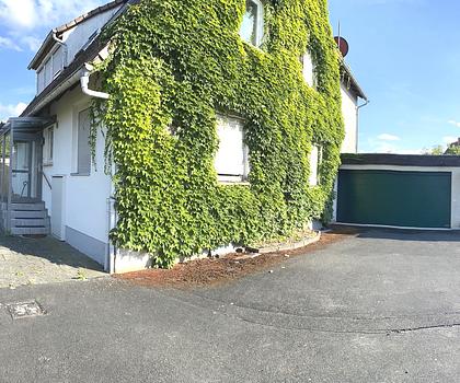 Einfamilienhaus mit Wintergarten, Doppelgarage & Traumgrundstück in Langenzenn - zum Revovieren