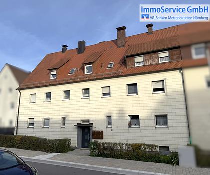 Vollvermietetes Mehrfamilienhaus mit 8 Wohneinheiten und Garten.